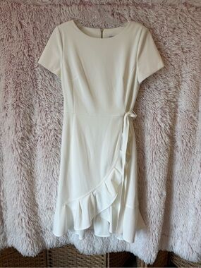 Elegant White Wrap-Style Ruffle Hem Dress